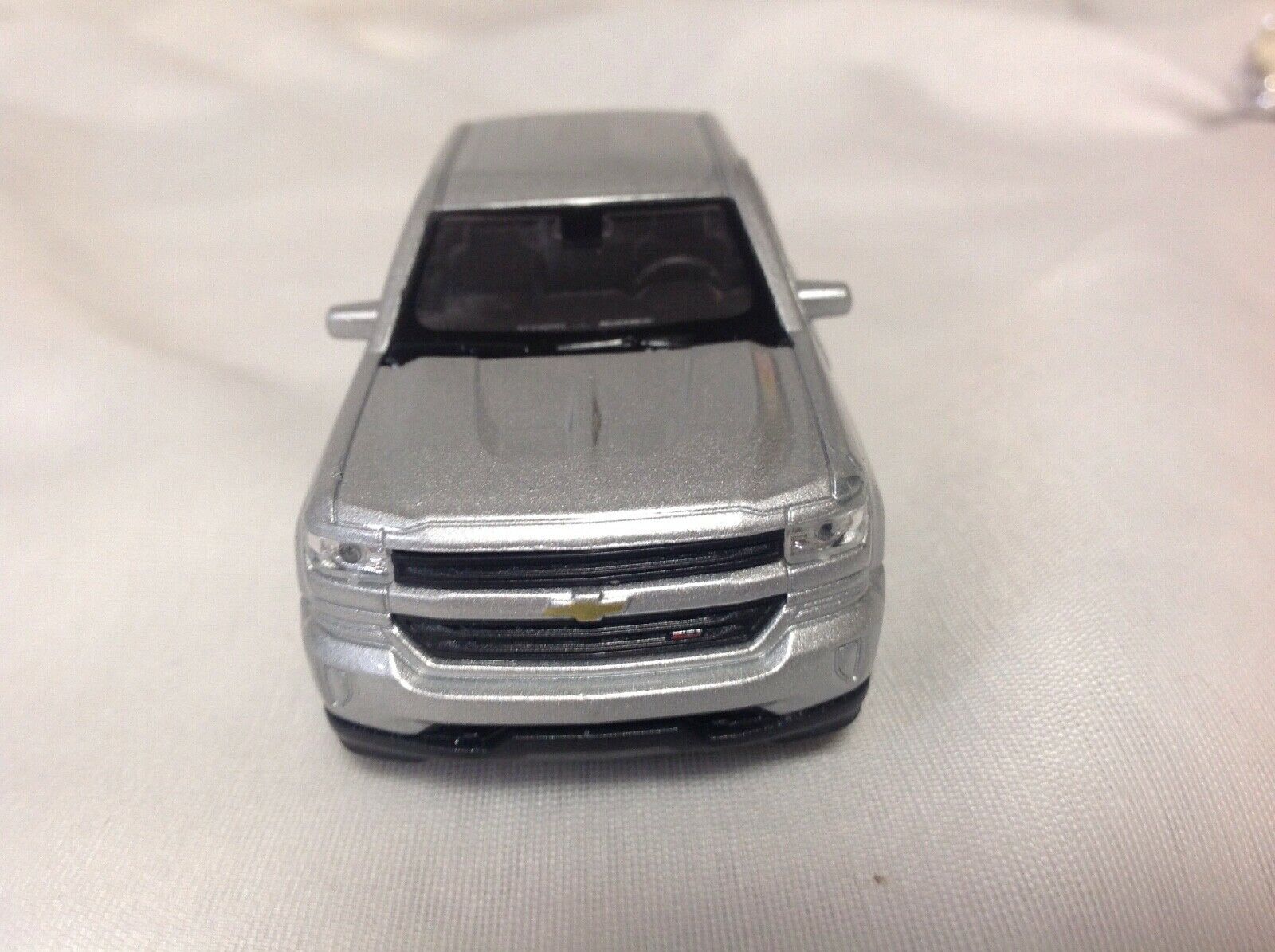 Игрушка модель машины 1:38 Chevrolet Silverado  